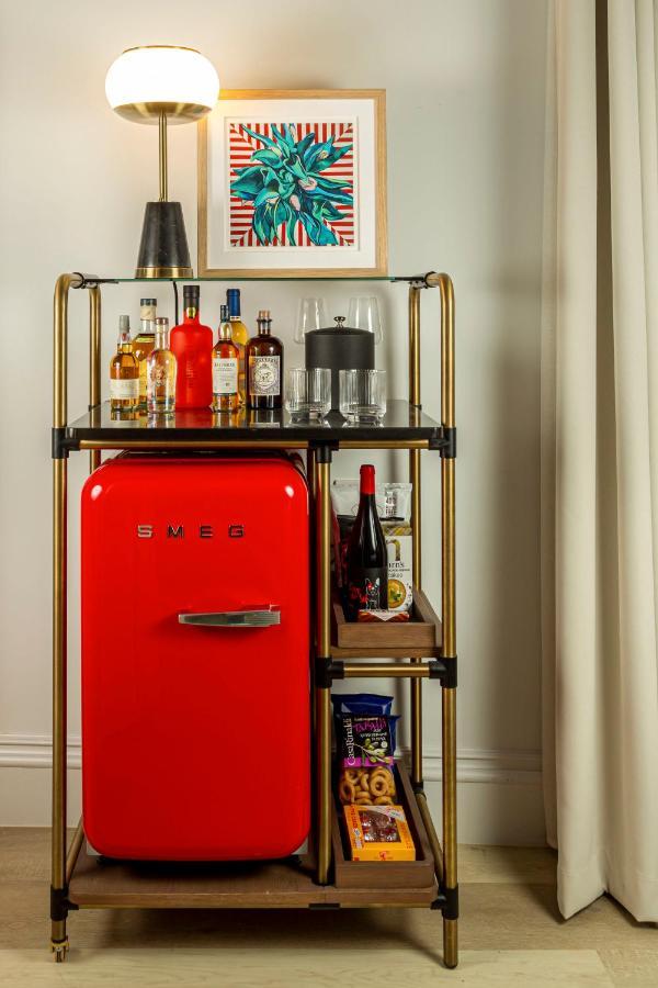 Virgin Hotels Edinburgh Exterior photo A bar cart with a refrigerator